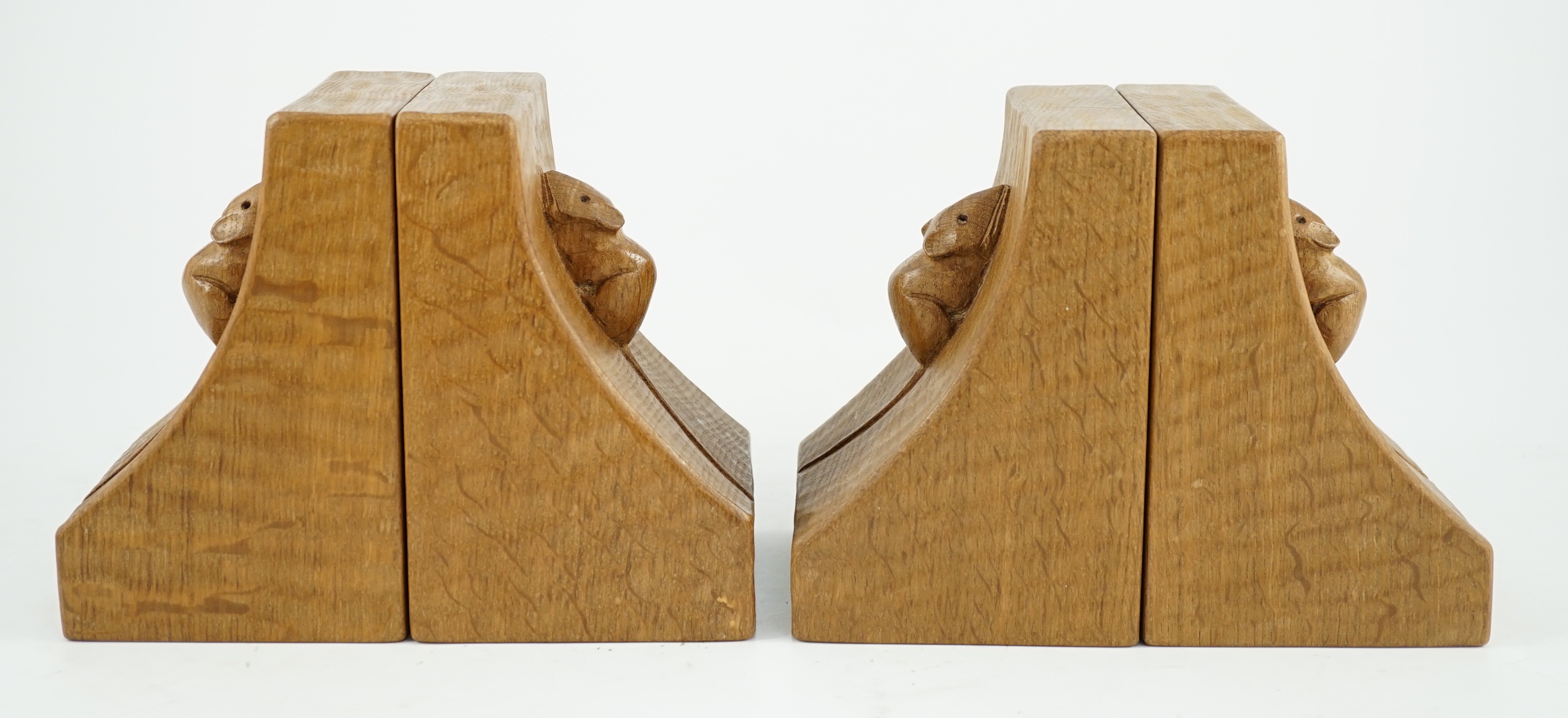 Two pairs of Robert Thompson Mouseman Thompson oak bookends, width 9.5cm depth 9.5cm height 15cm